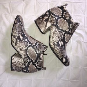 Snake skin Franco Sarto booties.